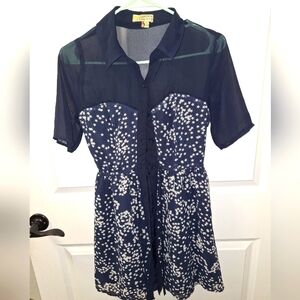 A Vera Wang Princess Star Navy dress with a sheer collar in a girl's size 5.